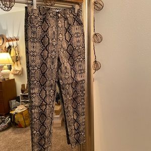 Snakeskin skinny jeans